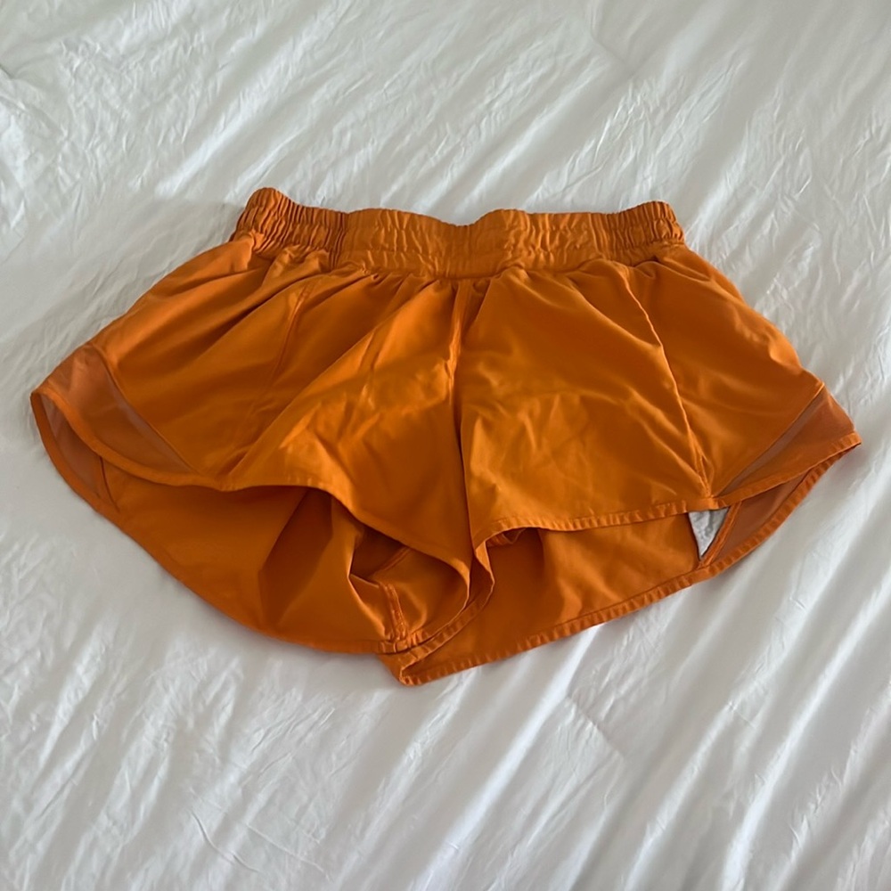 Size 6 orange lululemon hotty hot shorts
